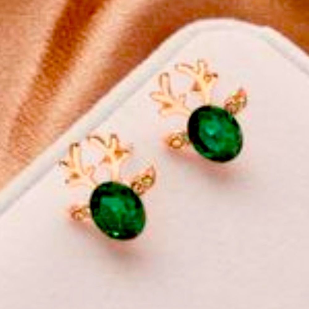 Reindeer stud earrings. New in package.